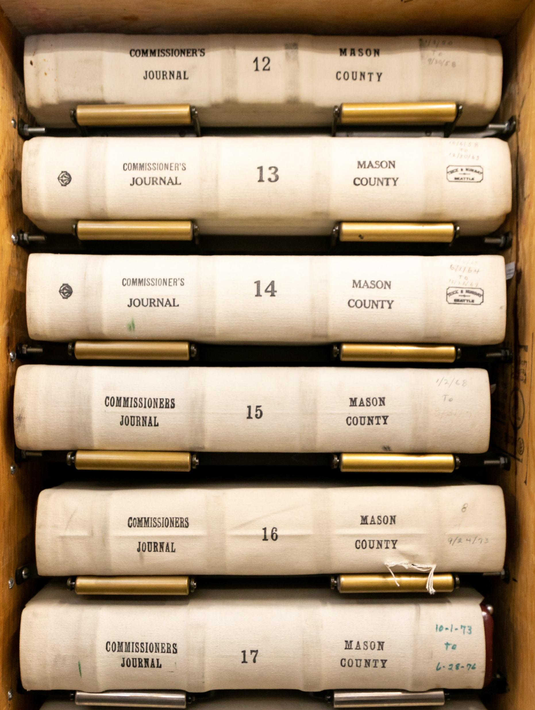 Stacks of commissioners journals from Mason County